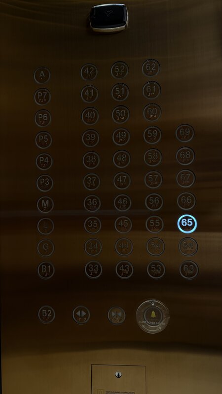 Paramount Hotel elevator panel — floor 65 lit up