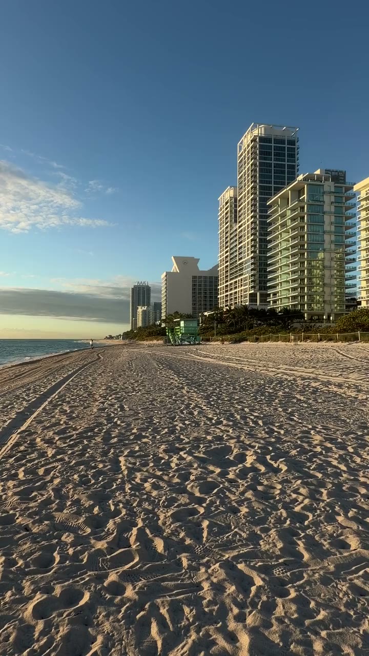 Miami Beach lifeguard tower 69 — turquoise and green against blue sky